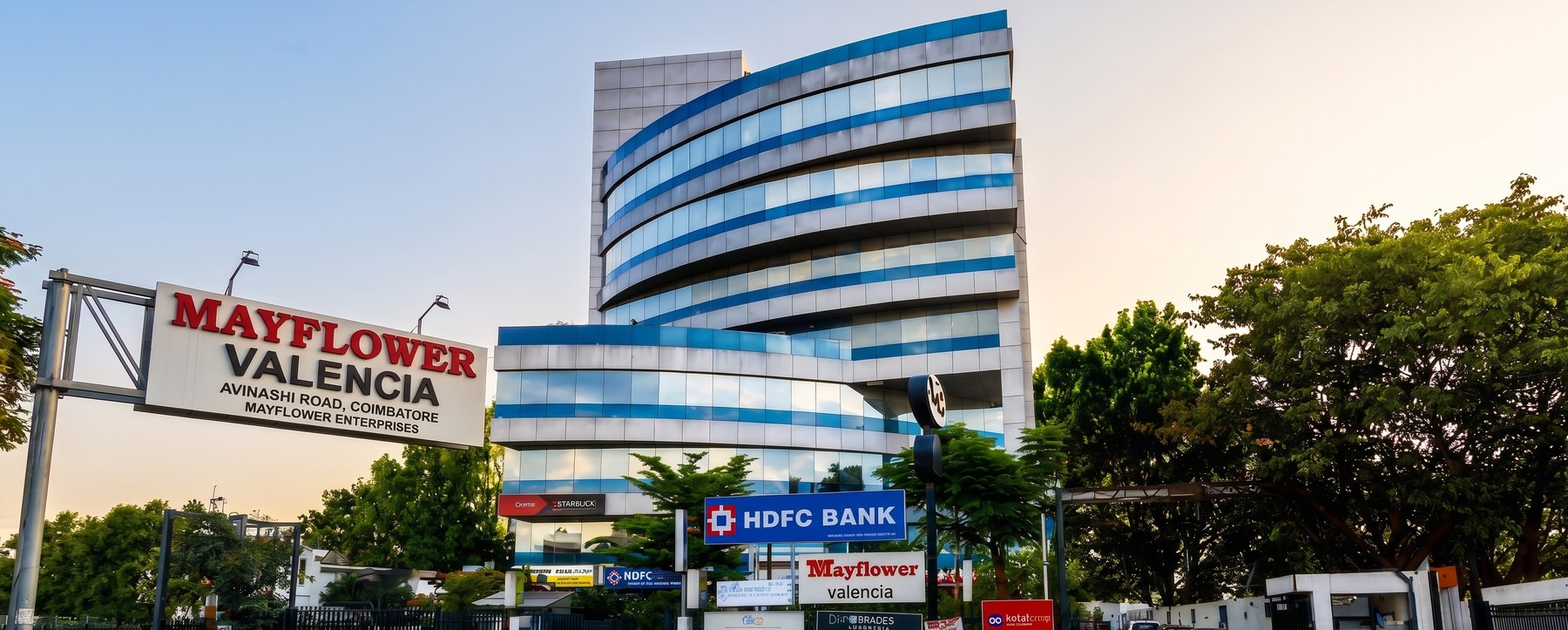 Mayflower Valencia building on Avinashi Road, Coimbatore — a modern glass office building with NRD Tech's office on the 1st floor